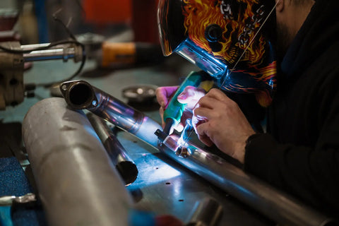 a welder is using TIG Welding function to weld